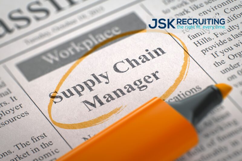 A newspaper with the headline " supply chain manager." Photo is watermarked with the JSK Recruiting logo.