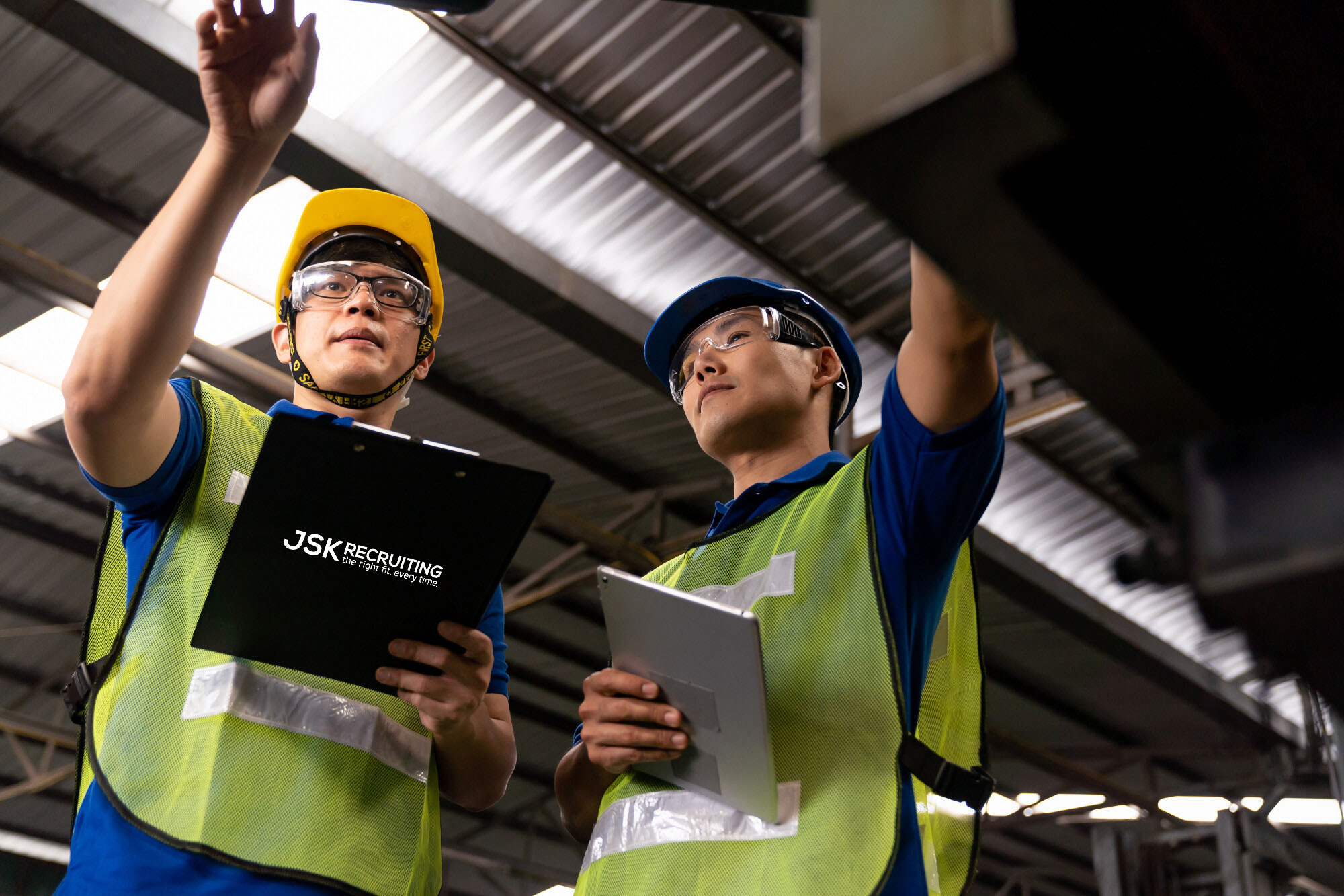 two engineers checking product